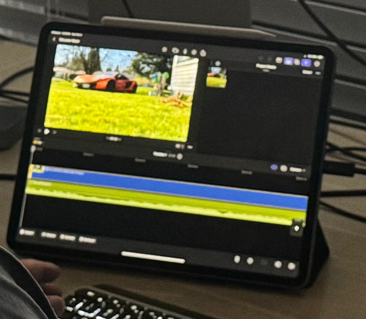 Detail of an iPad showing a video edit timeline.